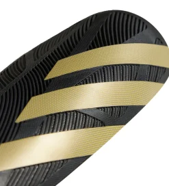 adidas Performance Benskinner - Tiro SG Com - Black/Goldmt/White